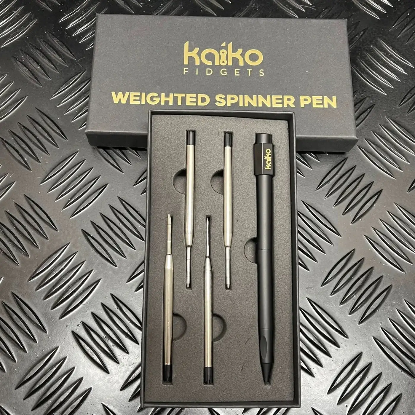 Black Weighted Spinner Pen 4 with refills